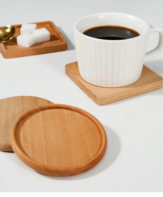 Prácticos de costa de consumición en blanco de la taza de café de los prácticos de costa los 9cm cuadrados de madera de bambú de la bebida